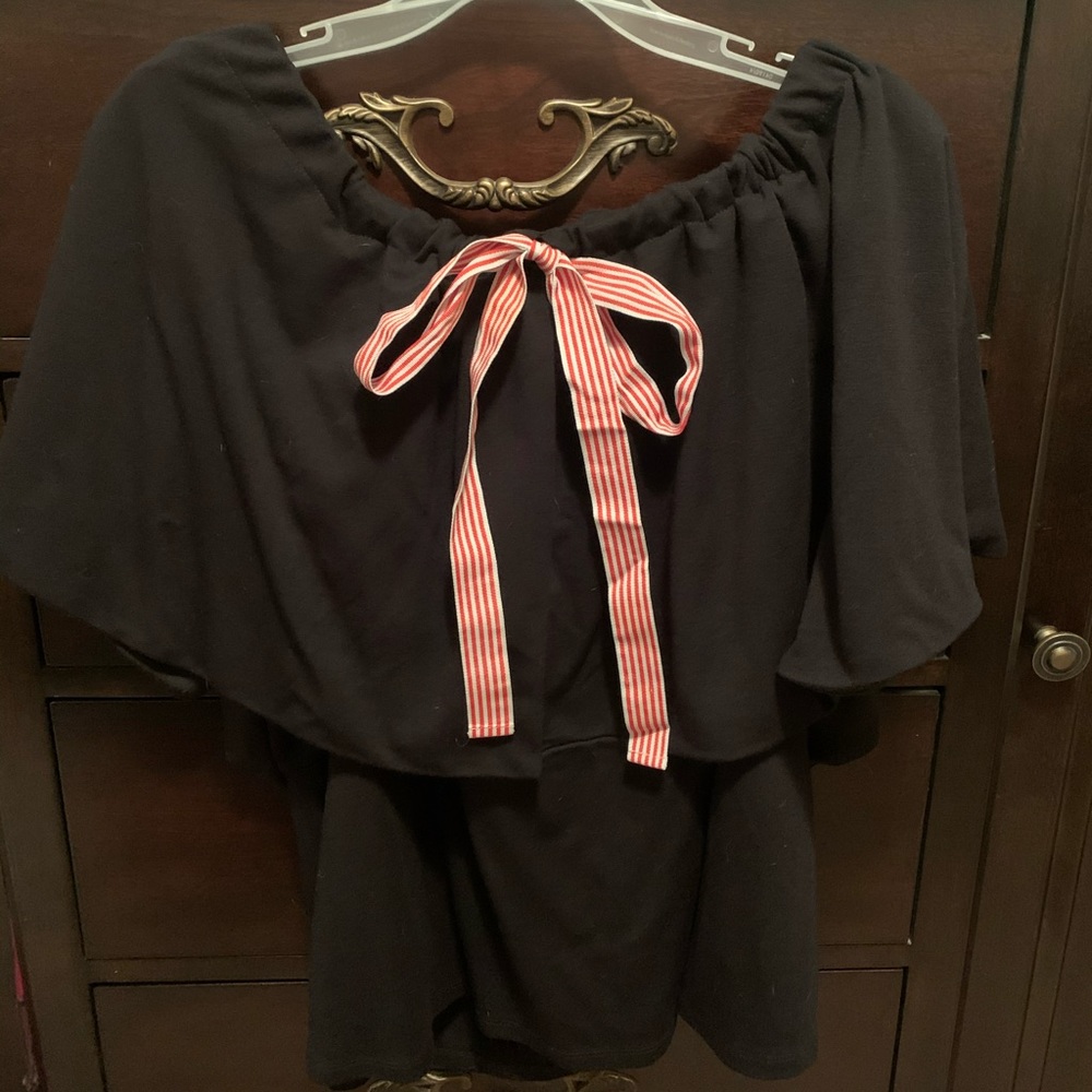 Eloquii black off the shoulder shirt.